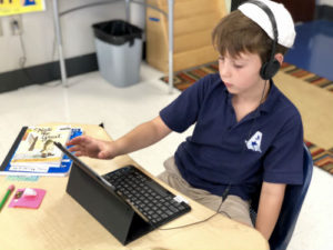 Addelstone Hebrew School -Student on Computer - Charleston SC - HP Slider 3