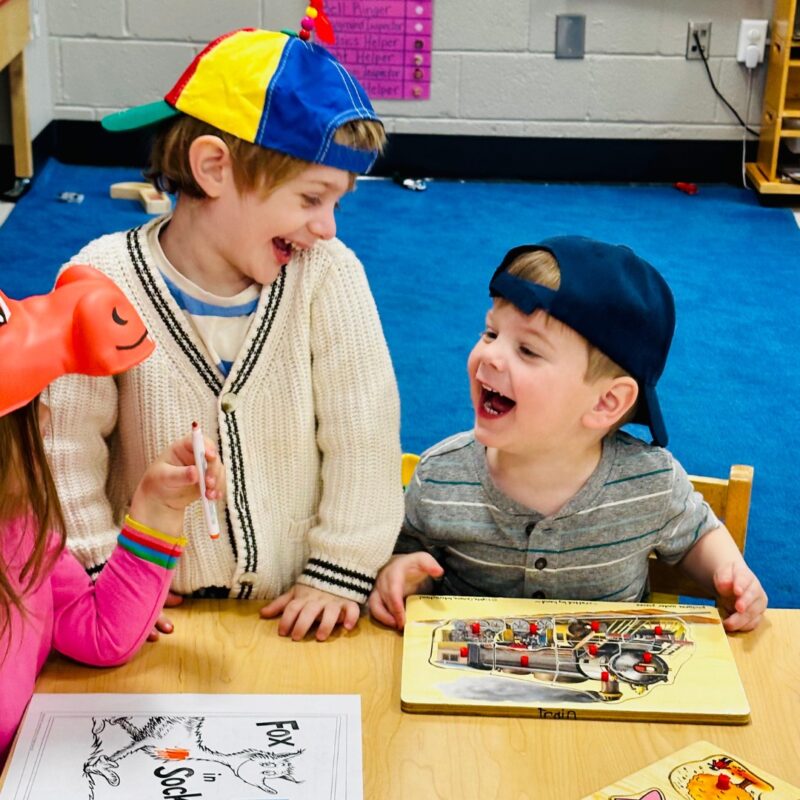 Two Children laughing at school